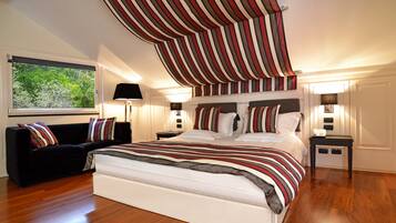 Premium bedding, down duvets, minibar, in-room safe