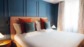Premium bedding, down duvets, minibar, in-room safe
