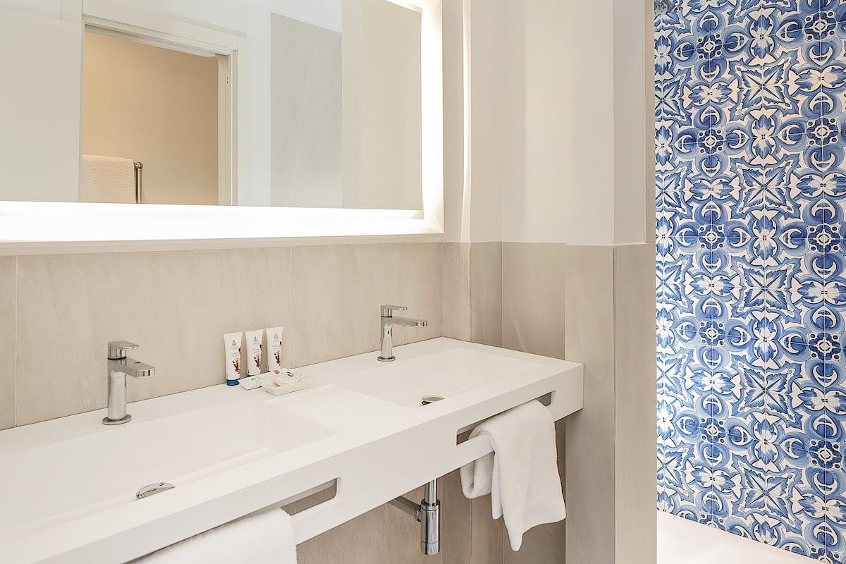 junior suite, 1 king bed with sofa bed, terrace, sea view (modern junior suite terrace sea view) | bathroom | designer toiletries, hair dryer, bidet, towels