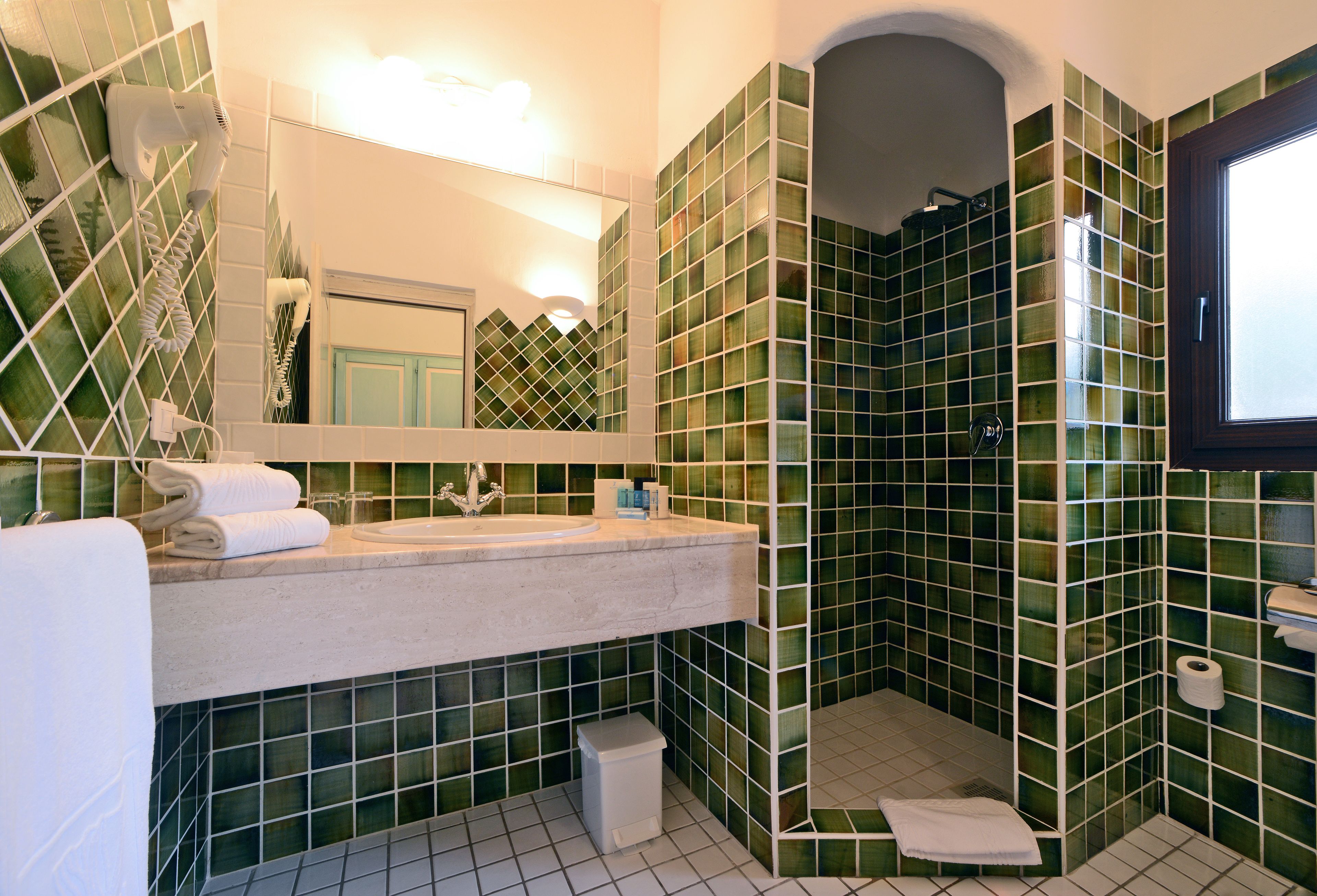 superior double room, patio, sea view | bathroom | hair dryer, slippers, towels