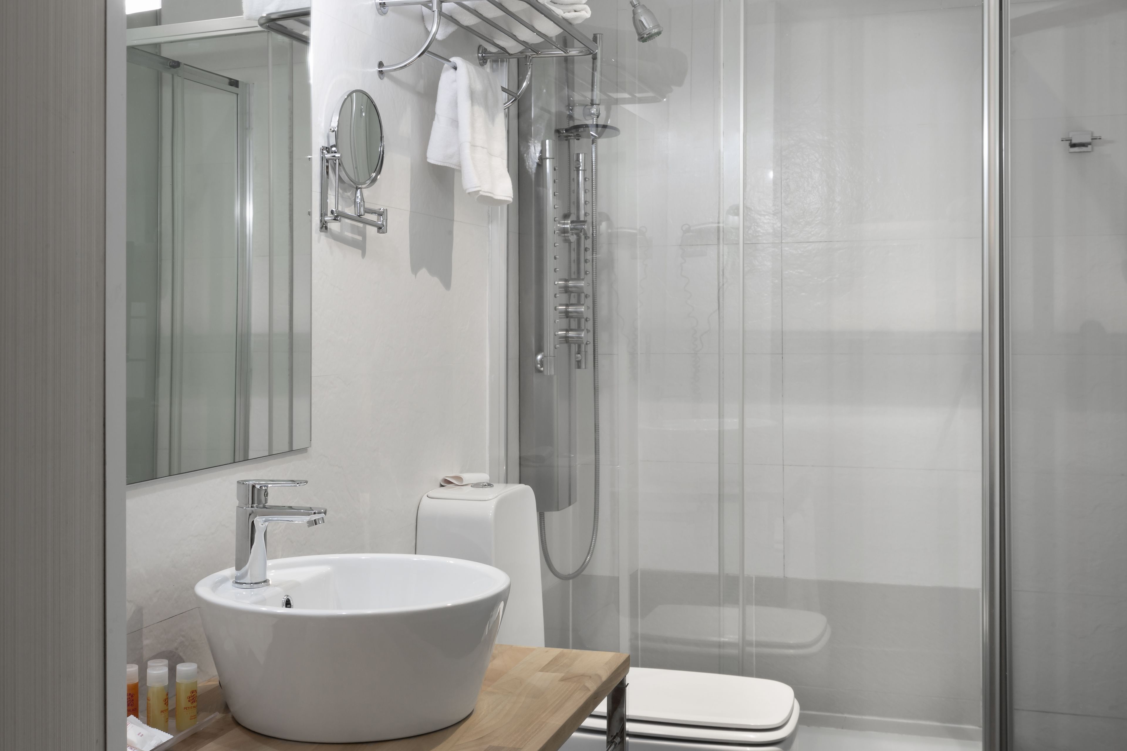 quadruple room | bathroom | shower, designer toiletries, hair dryer, towels