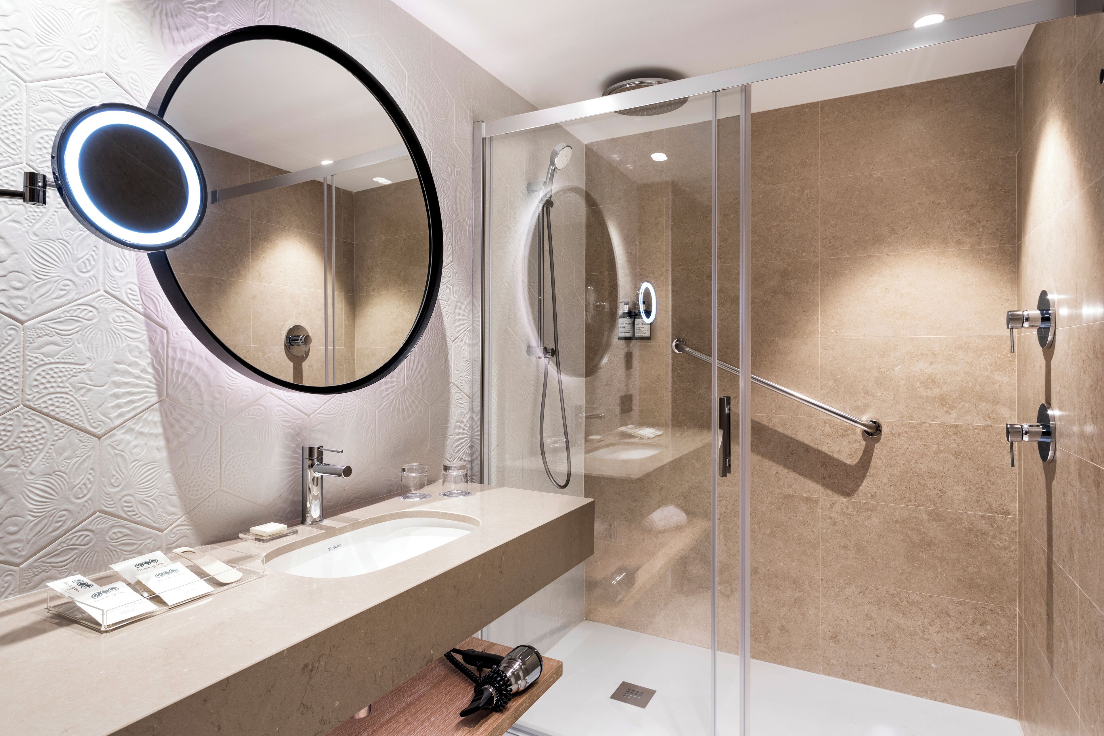 eco-friendly toiletries, hair dryer, towels