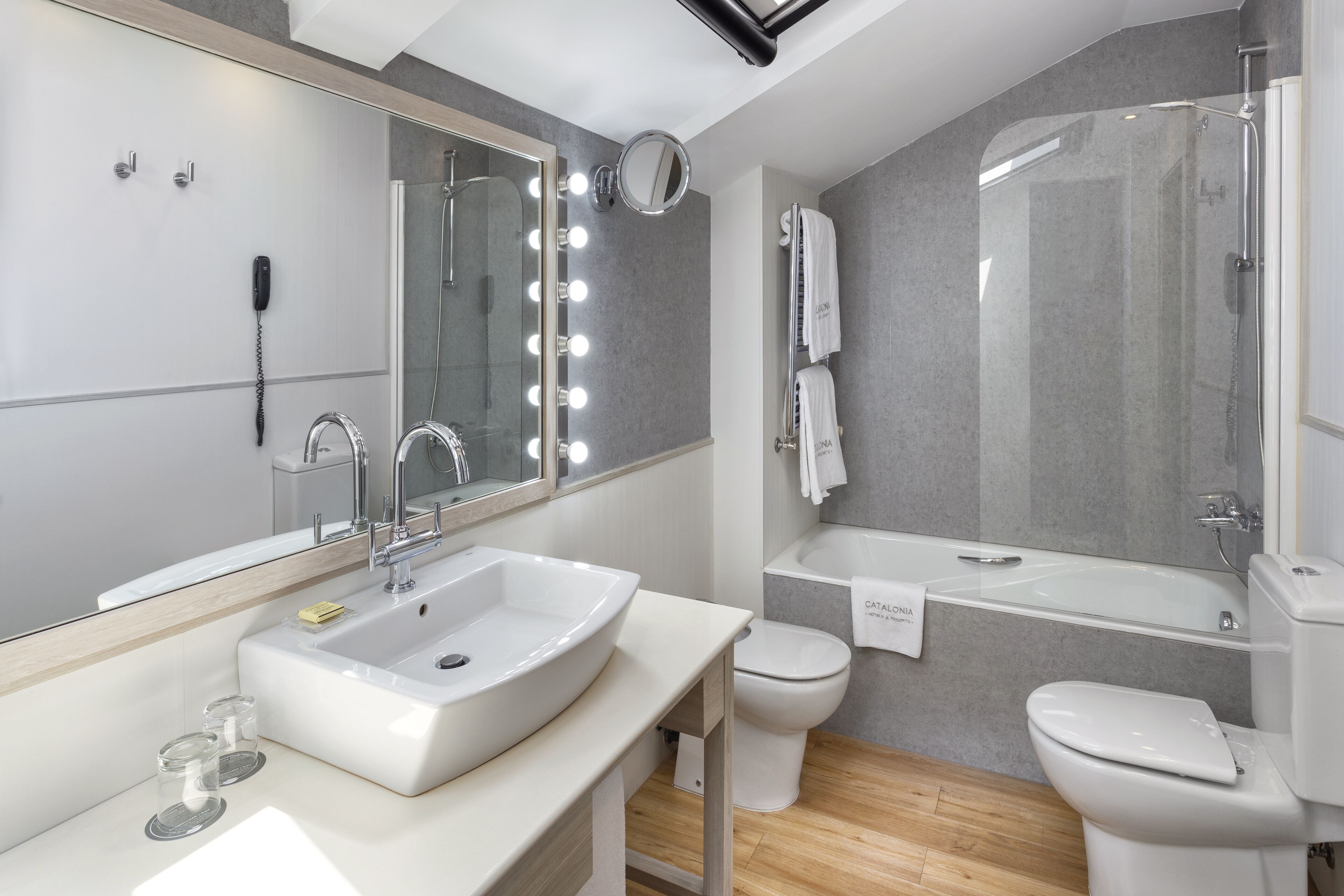 eco-friendly toiletries, hair dryer, towels