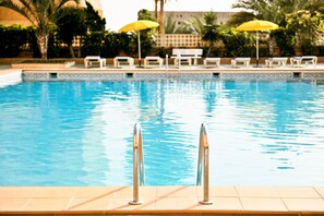 Outdoor pool, pool umbrellas, pool loungers