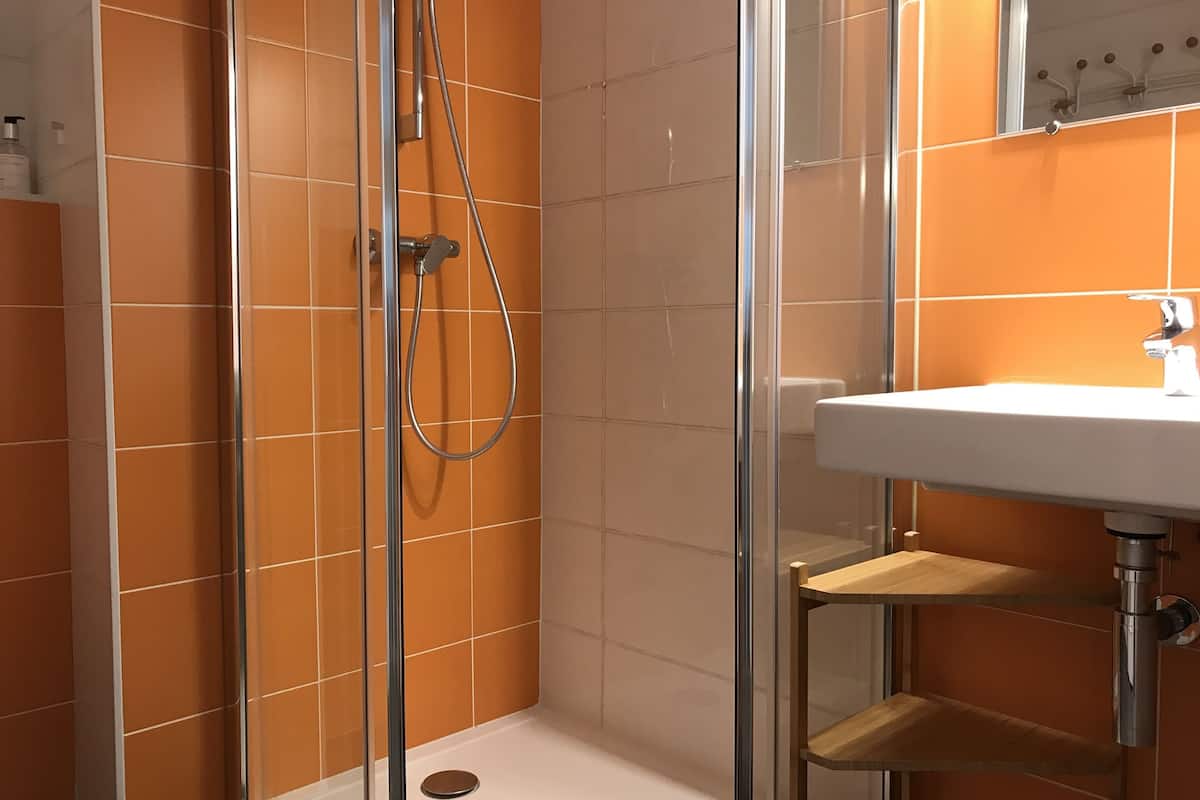 comfort double room, 1 double bed | bathroom | shower, free toiletries, hair dryer, towels