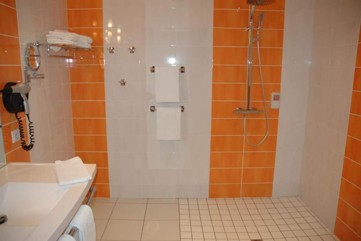 family room two double beds | bathroom | hair dryer, towels