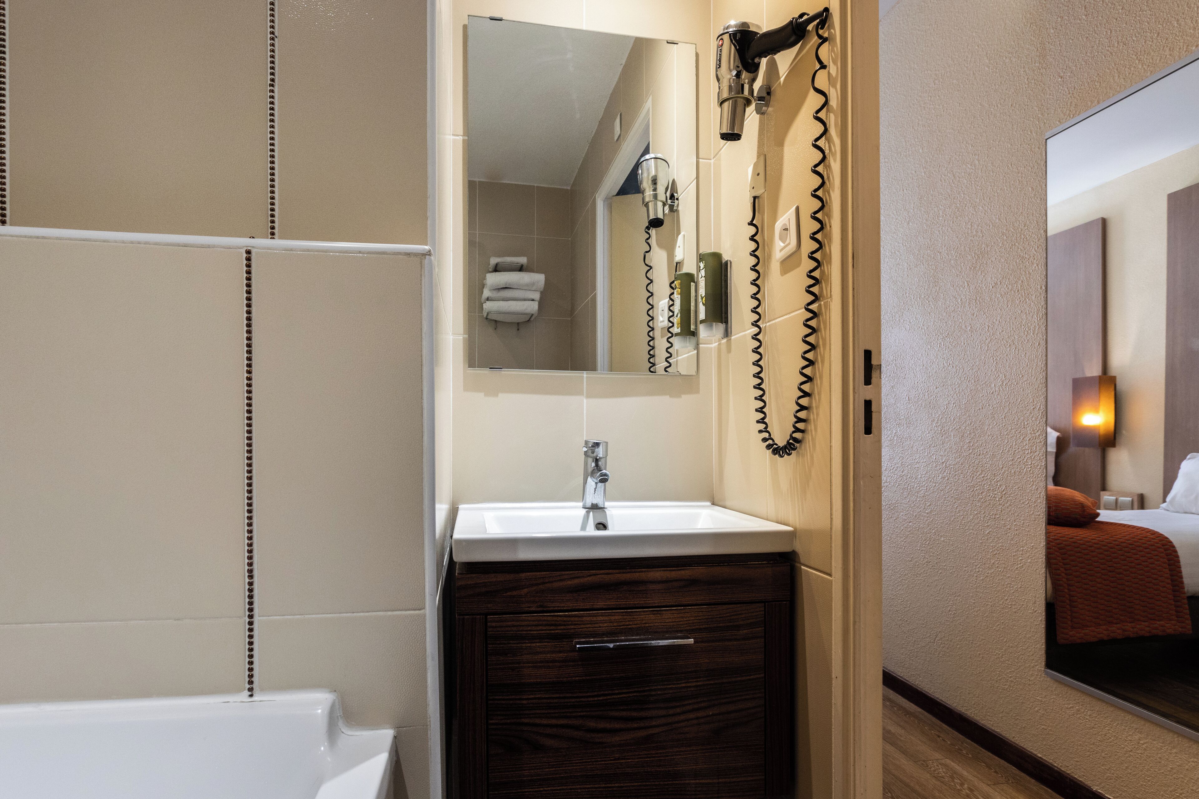 superior triple room, bathtub | bathroom | hair dryer, towels