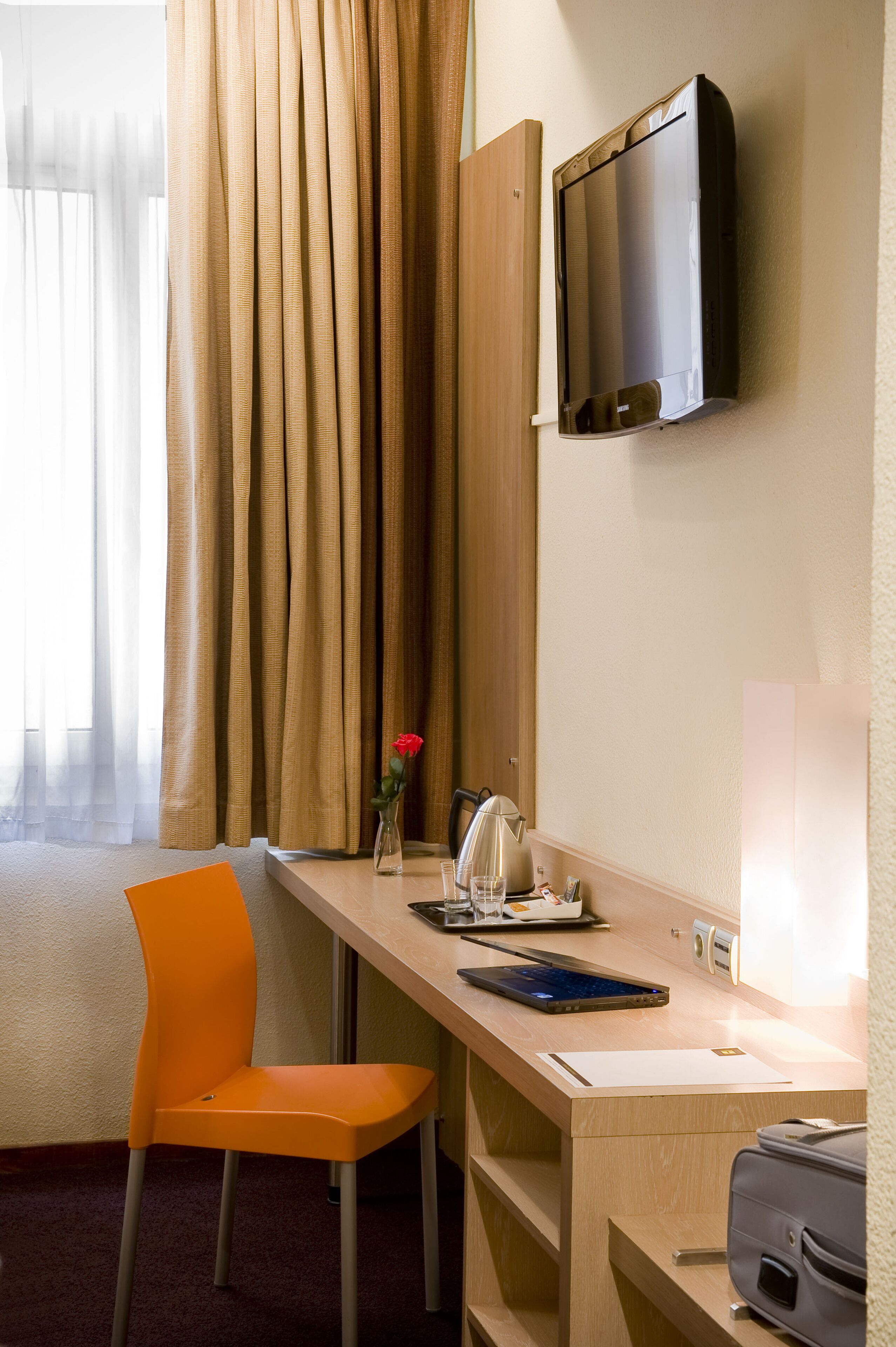 premium bedding, desk, laptop workspace, blackout curtains