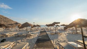 Private beach, white sand, sun-loungers, beach umbrellas