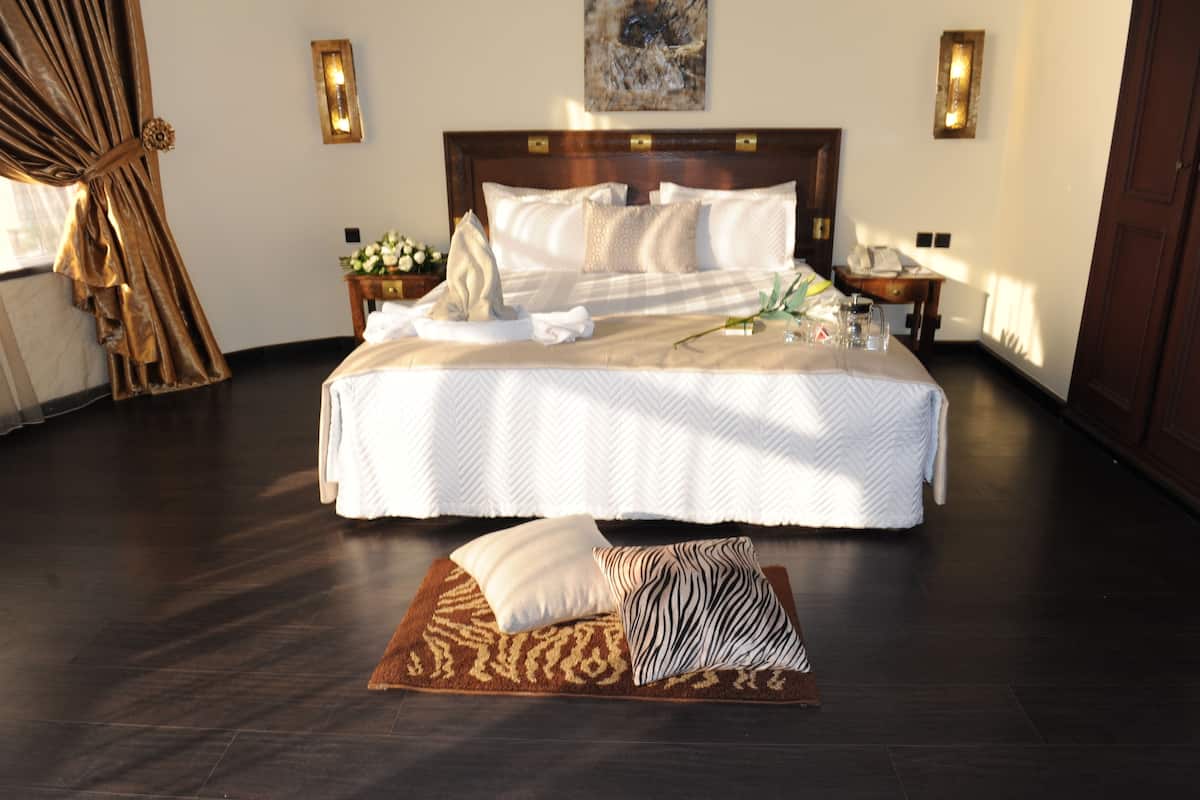 Royal Suite, Smoking | Premium bedding, in-room safe, desk, blackout drapes