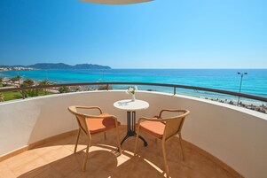 Double Room, Balcony, Sea View | Minibar, in-room safe, desk, iron/ironing board