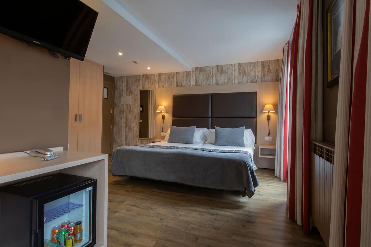 double or twin room | minibar, in-room safe, desk, laptop workspace