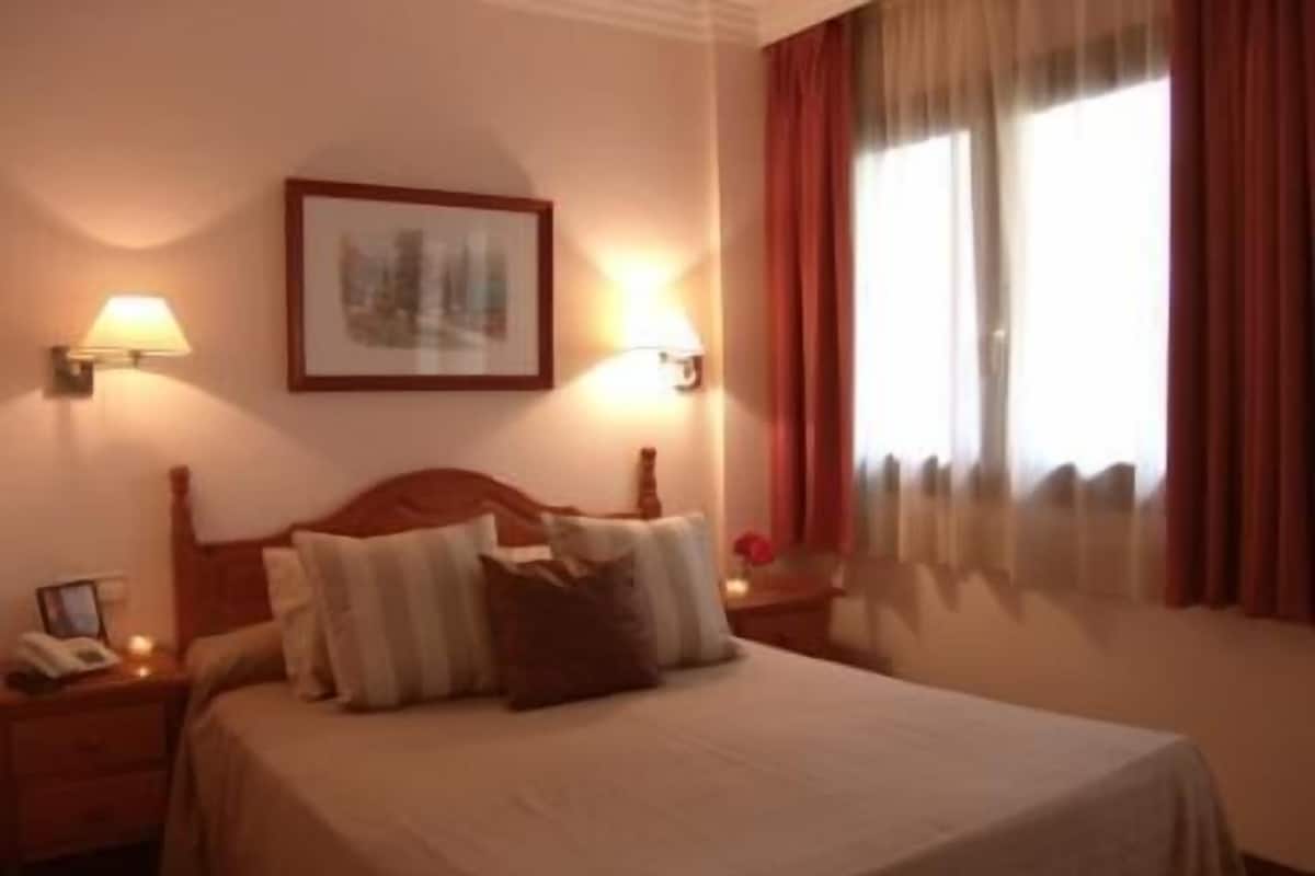 In-room safe, iron/ironing board (on request), free cots/infant beds