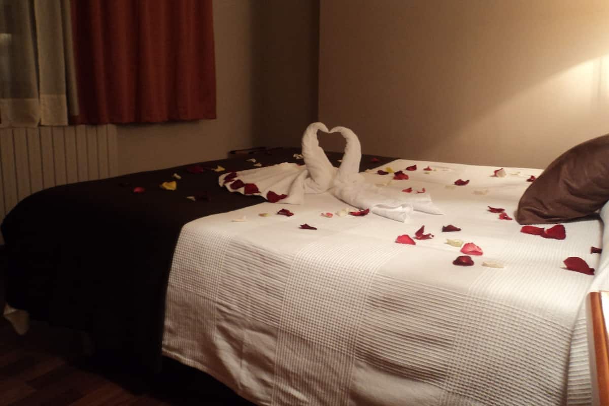 In-room safe, iron/ironing board (on request), free cots/infant beds