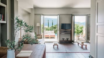 Maisonette (2 Levels, Sea View, Shared Pool) | Living room | Plasma TV, DVD player, iPod dock