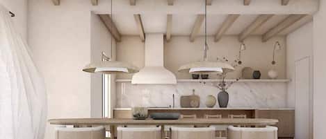 Una cocina moderna con una mesa y sillas de madera, iluminación colgante y encimeras de mármol.