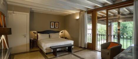 Hypo-allergenic bedding, down comforters, minibar, in-room safe