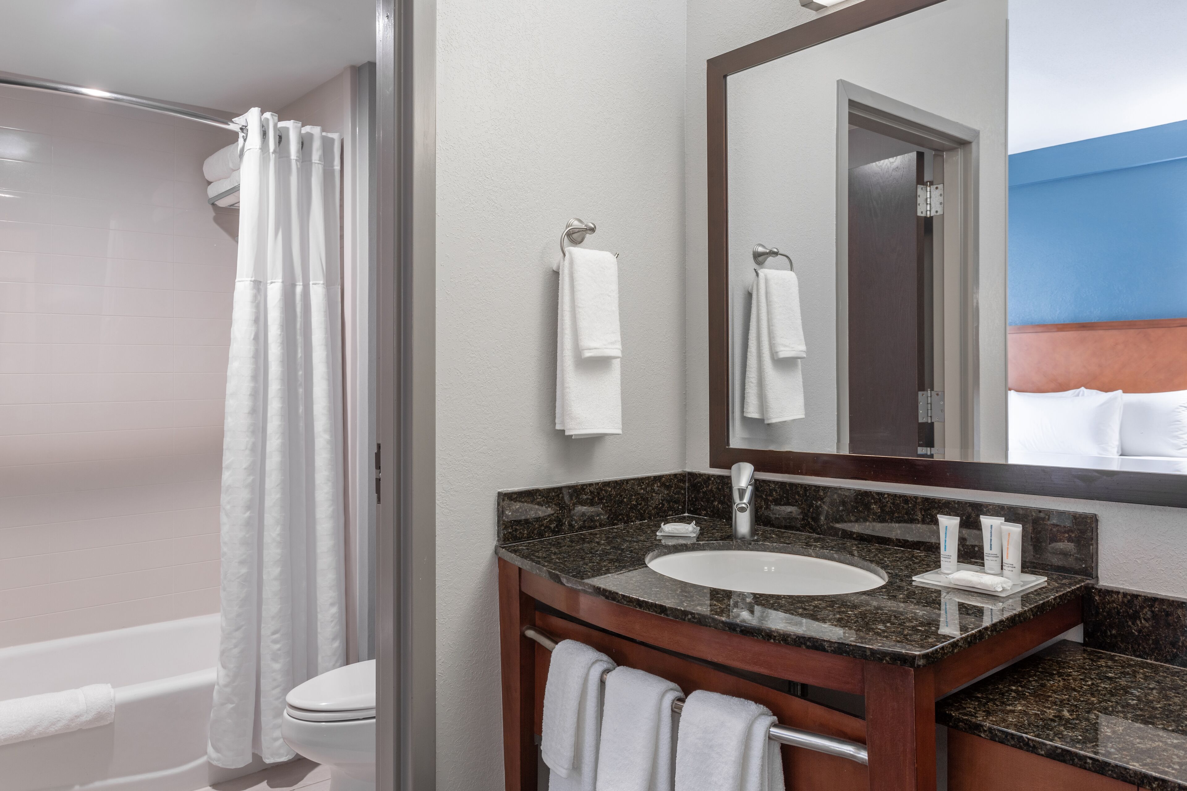 standard room, 2 queen beds | bathroom | shower, designer toiletries, hair dryer, towels