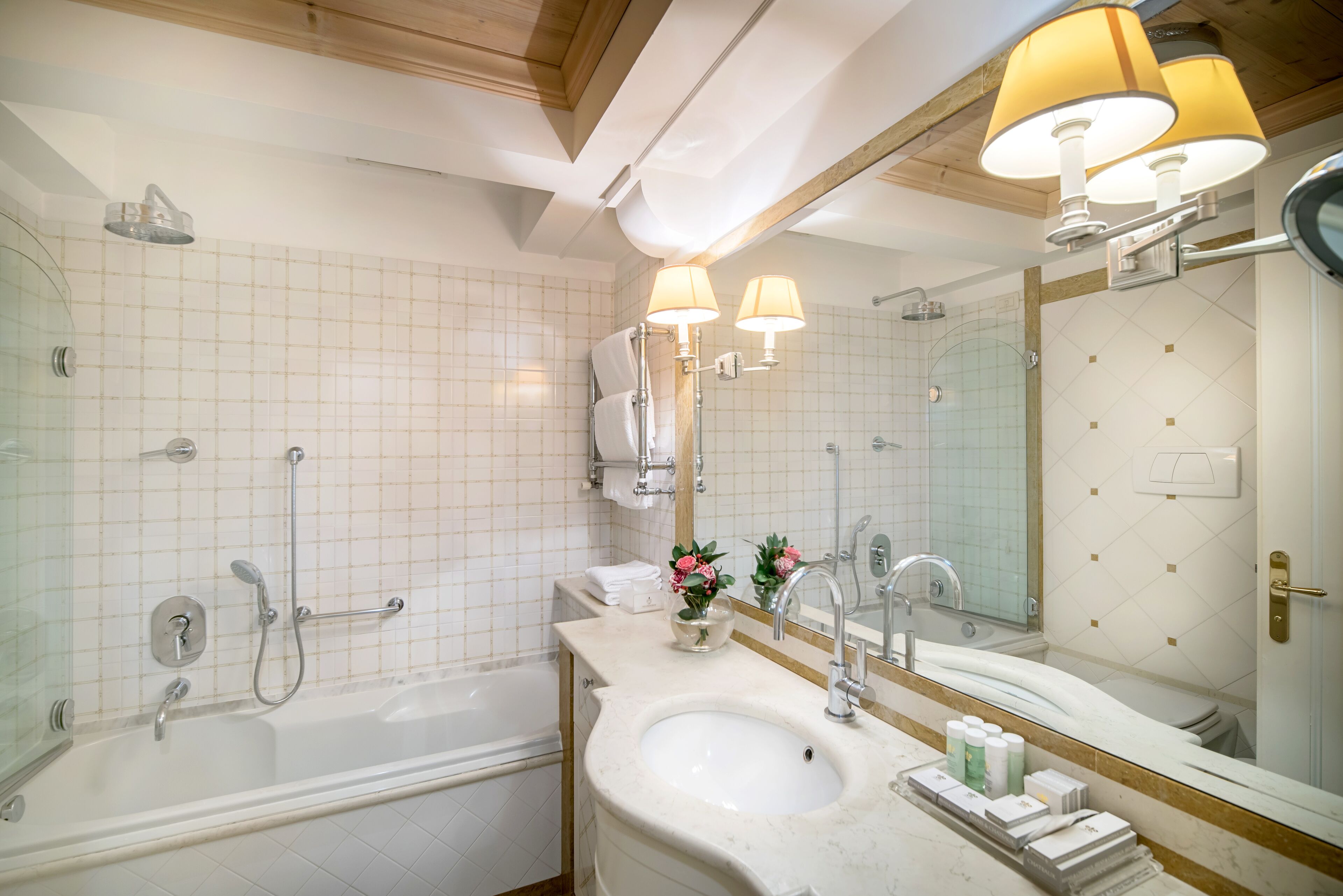 separate bathtub and shower, free toiletries, bathrobes, slippers