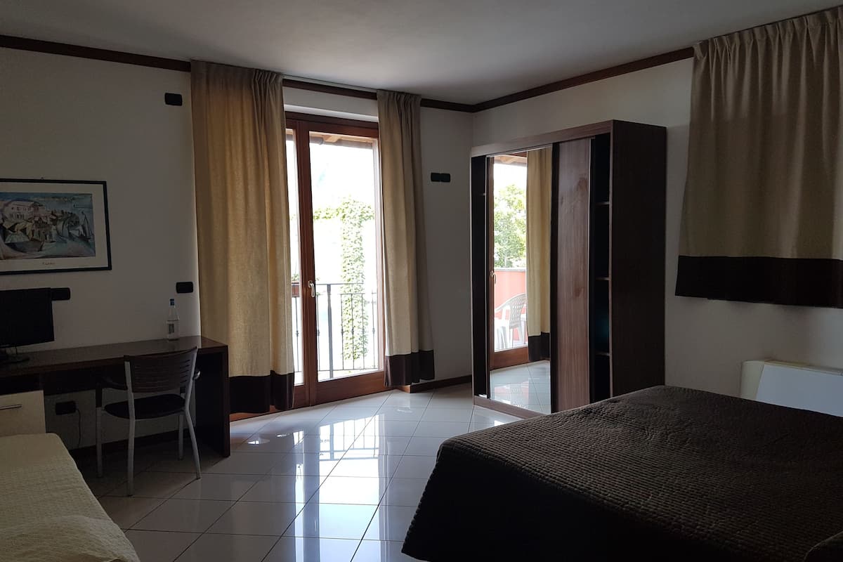 quadruple room | in-room safe, desk, soundproofing, iron/ironing board