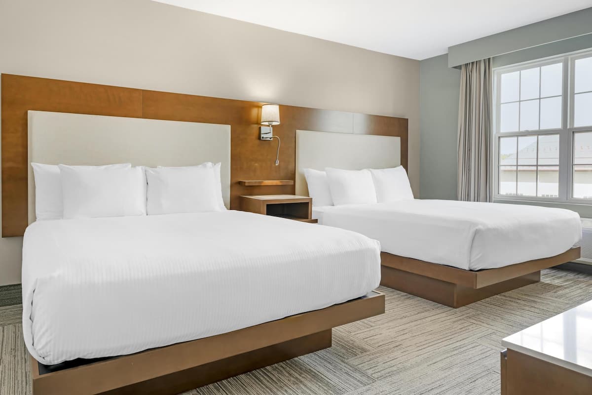 suite, 2 queen beds, non smoking, refrigerator & microwave (larger room;with sofabed) | premium bedding, pillow-top beds, in-room safe, laptop workspace