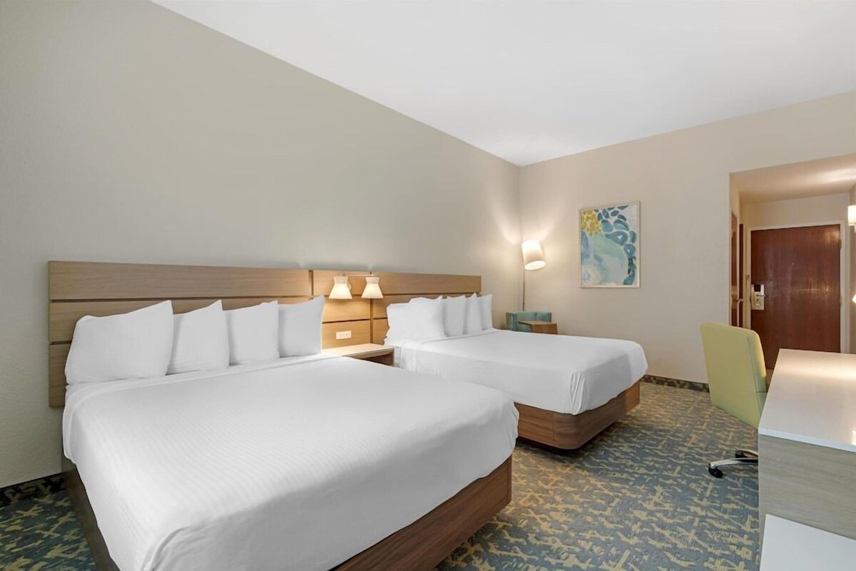 Premium bedding, pillowtop beds, desk, laptop workspace