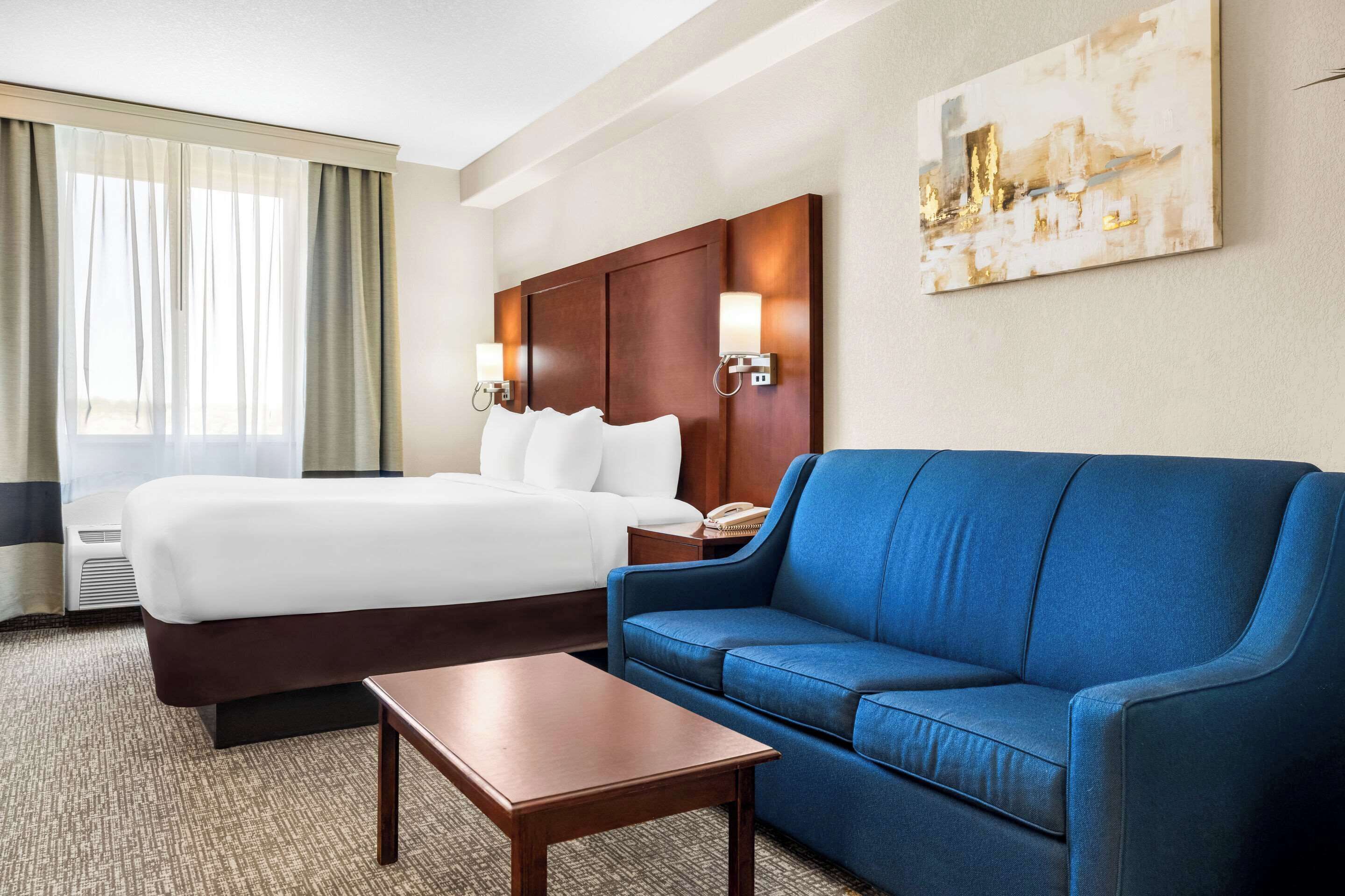 desk, laptop workspace, blackout curtains, iron/ironing board