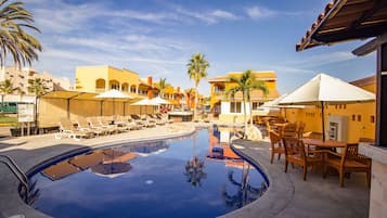 Outdoor pool, pool umbrellas, pool loungers