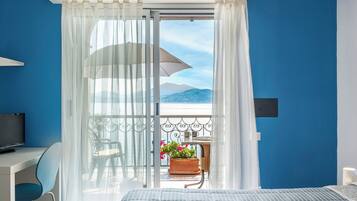 Doppia Standard, 1 letto matrimoniale, frigorifero e microonde | Una cassaforte in camera, una scrivania, Wi-Fi gratuito, lenzuola