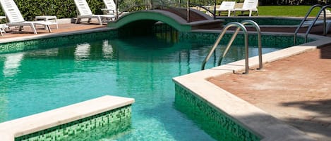 Seasonal outdoor pool, pool umbrellas, pool loungers