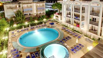 Seasonal outdoor pool, pool umbrellas, pool loungers