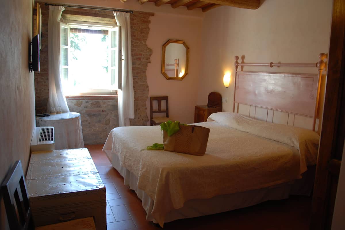 Classic Double Room | 1 bedroom, minibar, in-room safe, individually decorated