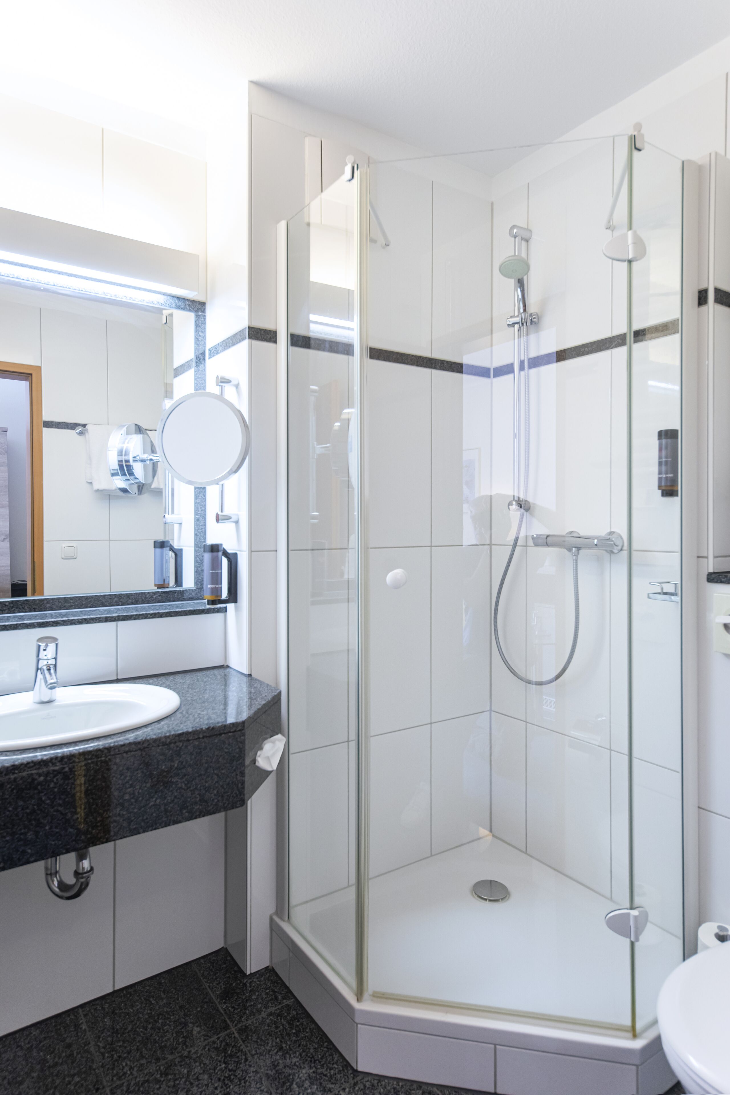 superior double room | bathroom | hair dryer, towels