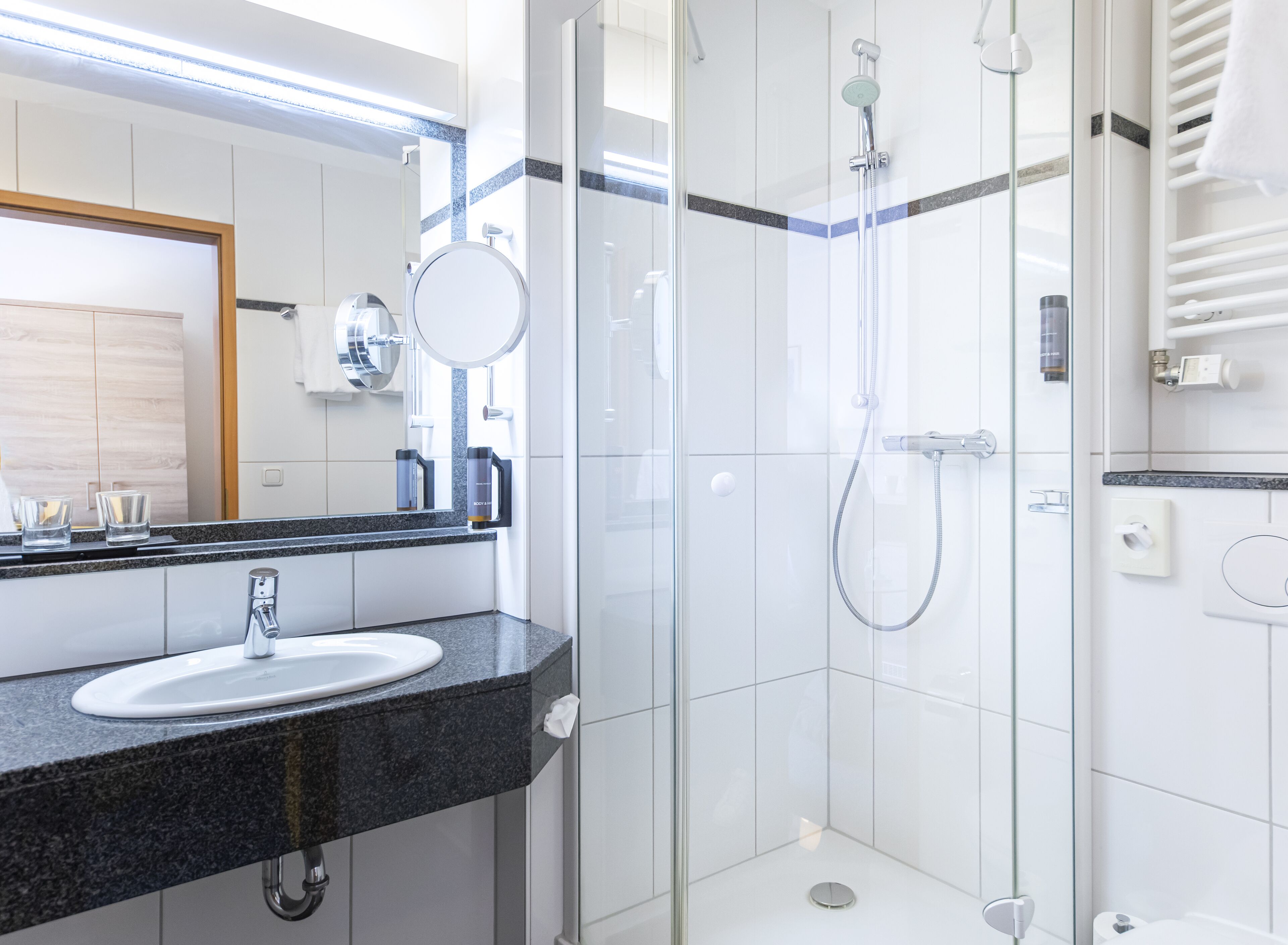 superior double room | bathroom | hair dryer, towels