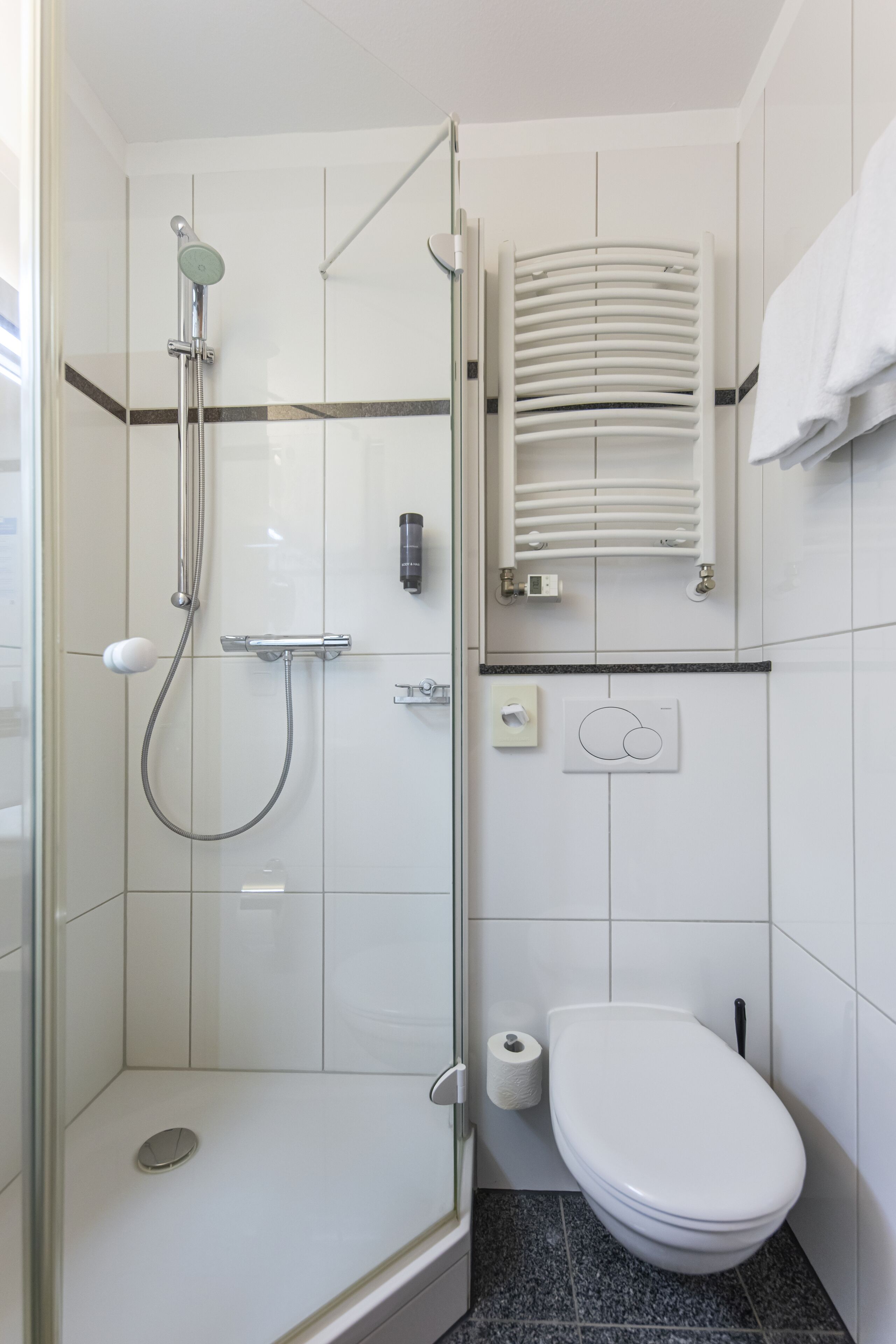 superior double room | bathroom | hair dryer, towels