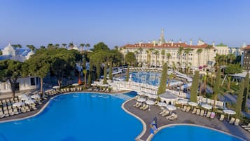 Indoor pool, seasonal outdoor pool, pool umbrellas, pool loungers