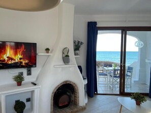 Family Apartment, 2 Bedrooms, Terrace, Sea View | Living area | Flat-screen TV