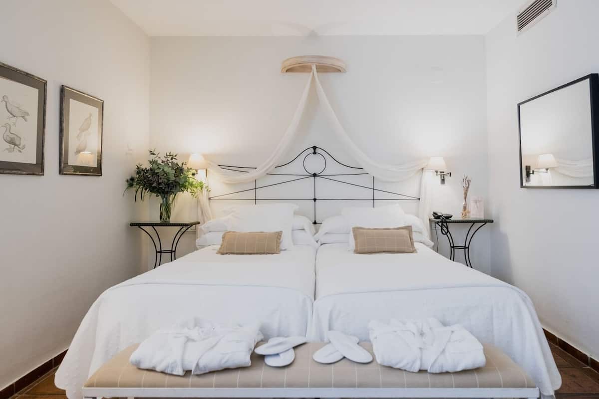 Premium bedding, down duvets, minibar, in-room safe