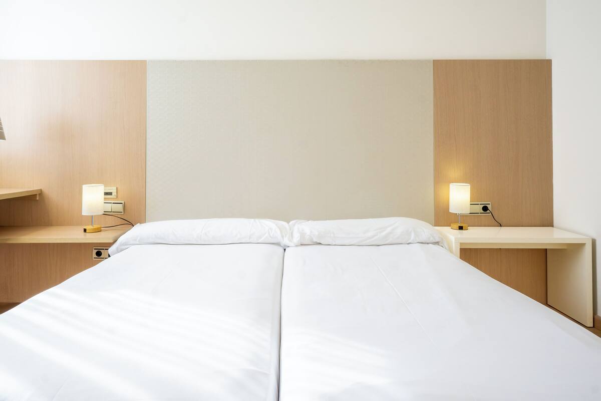 Standard Double or Twin Room, Accessible | Minibar, desk, laptop workspace, blackout drapes