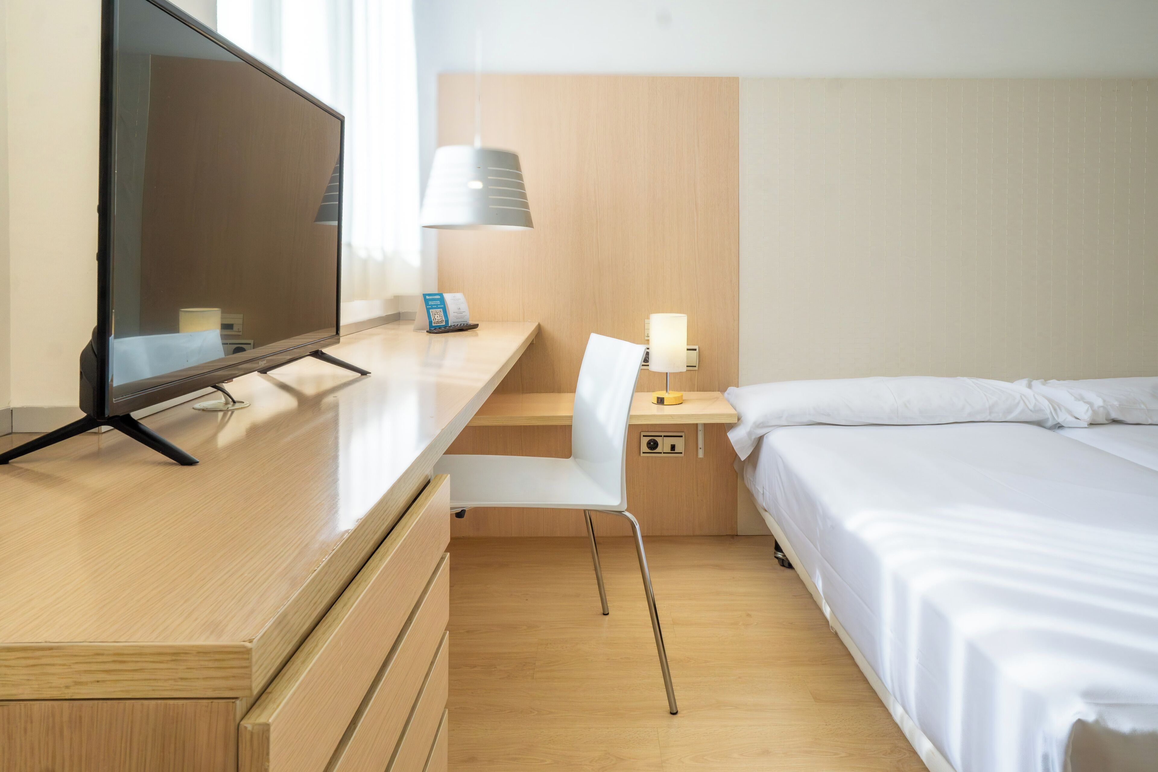 Standard Double or Twin Room, Accessible | Minibar, desk, laptop workspace, blackout drapes