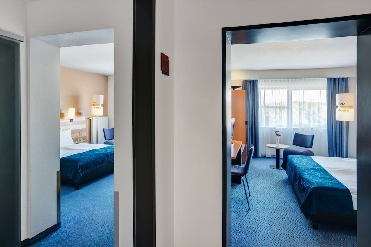 family room, 2 queen beds | hypo-allergenic bedding, minibar, in-room safe, desk