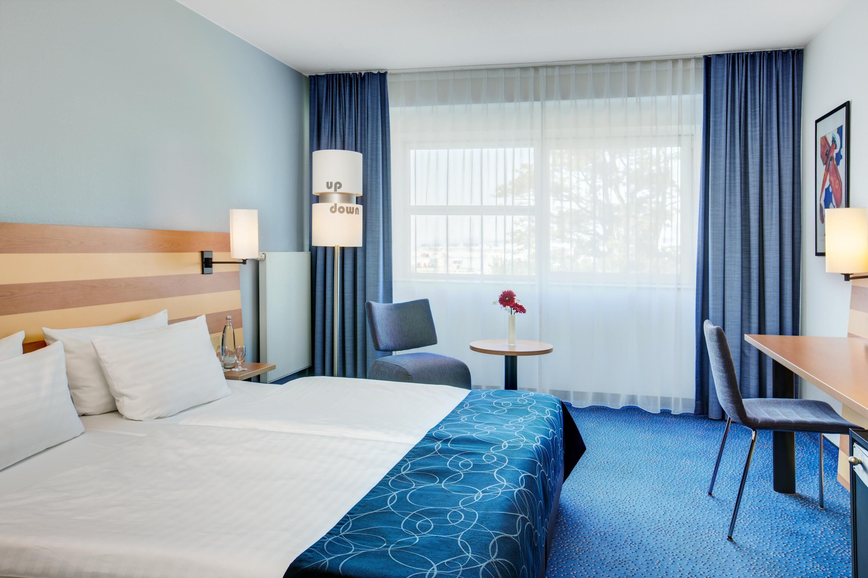 Hypo-allergenic bedding, minibar, in-room safe, desk