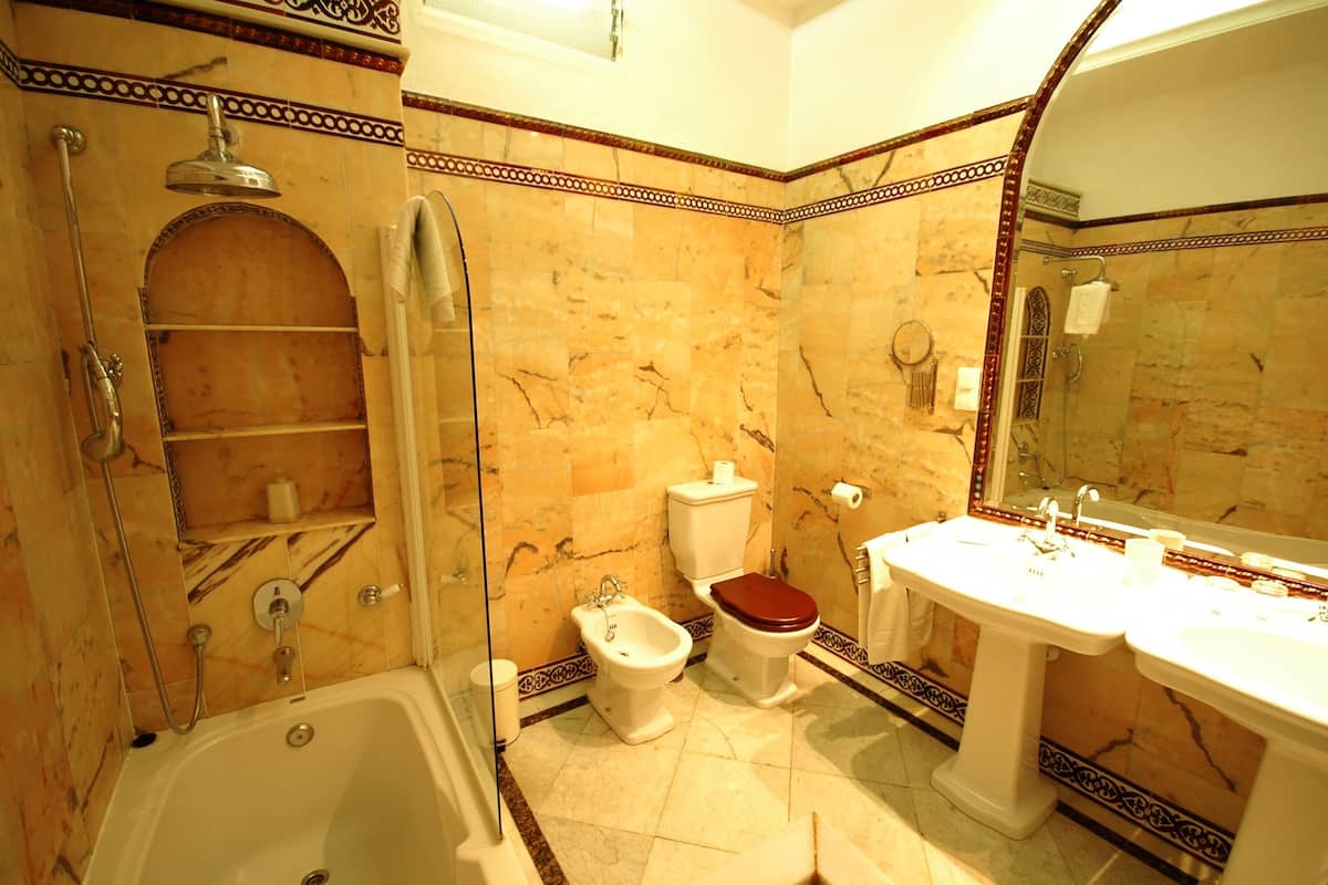 deluxe room (superior) | bathroom | shower, free toiletries, hair dryer, towels
