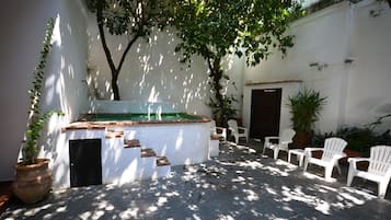 Seasonal outdoor pool, open 11:00 AM to 8:00 PM, pool loungers