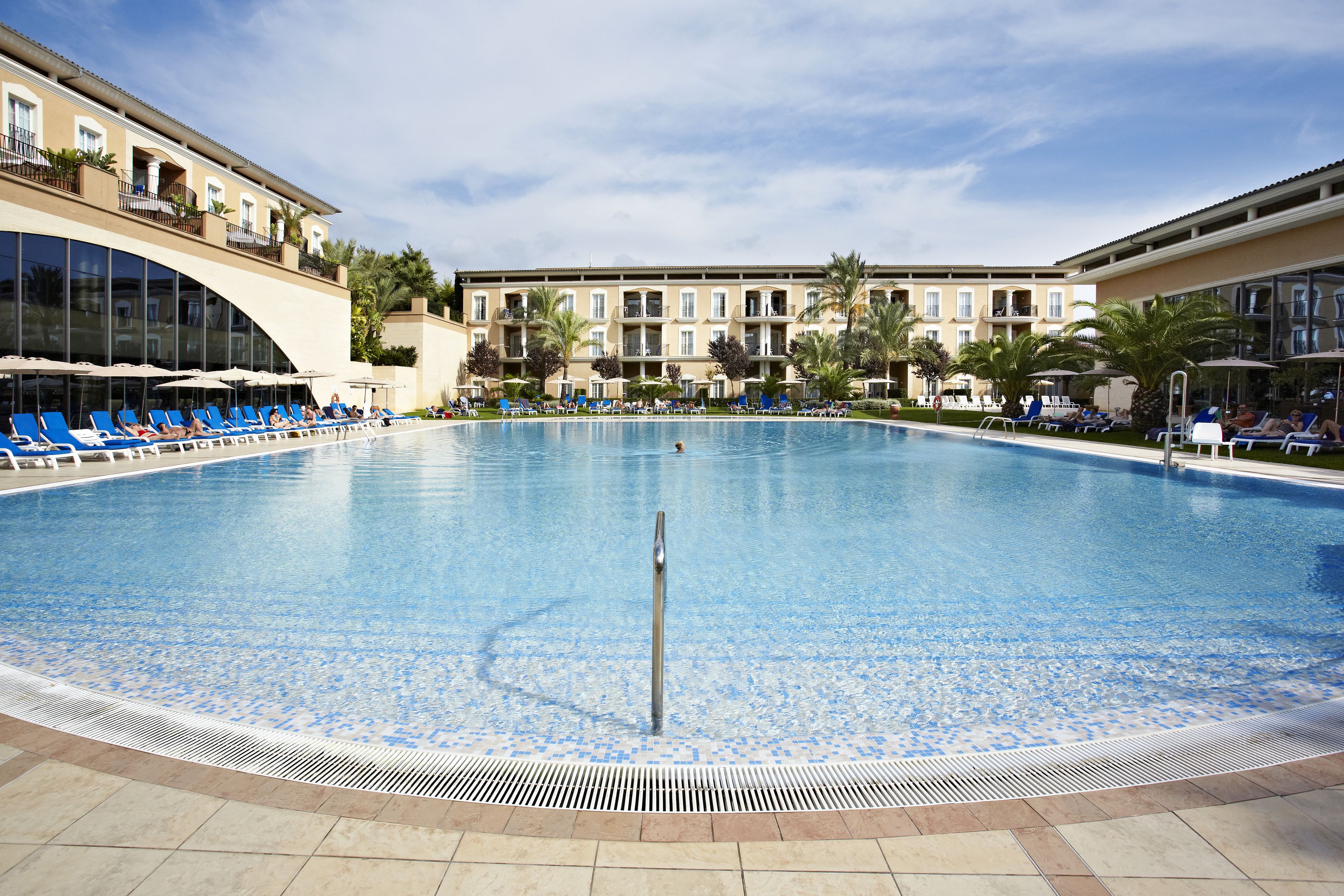 Indoor pool, outdoor pool, pool umbrellas, pool loungers