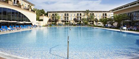 Indoor pool, outdoor pool, pool umbrellas, sun loungers
