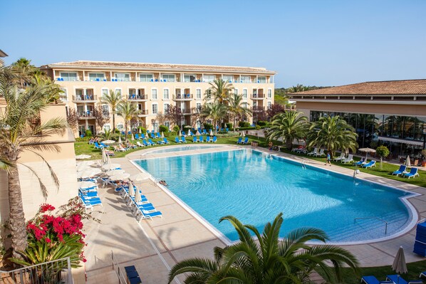 Indoor pool, outdoor pool, pool umbrellas, pool loungers