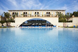 Indoor pool, outdoor pool, pool umbrellas, pool loungers