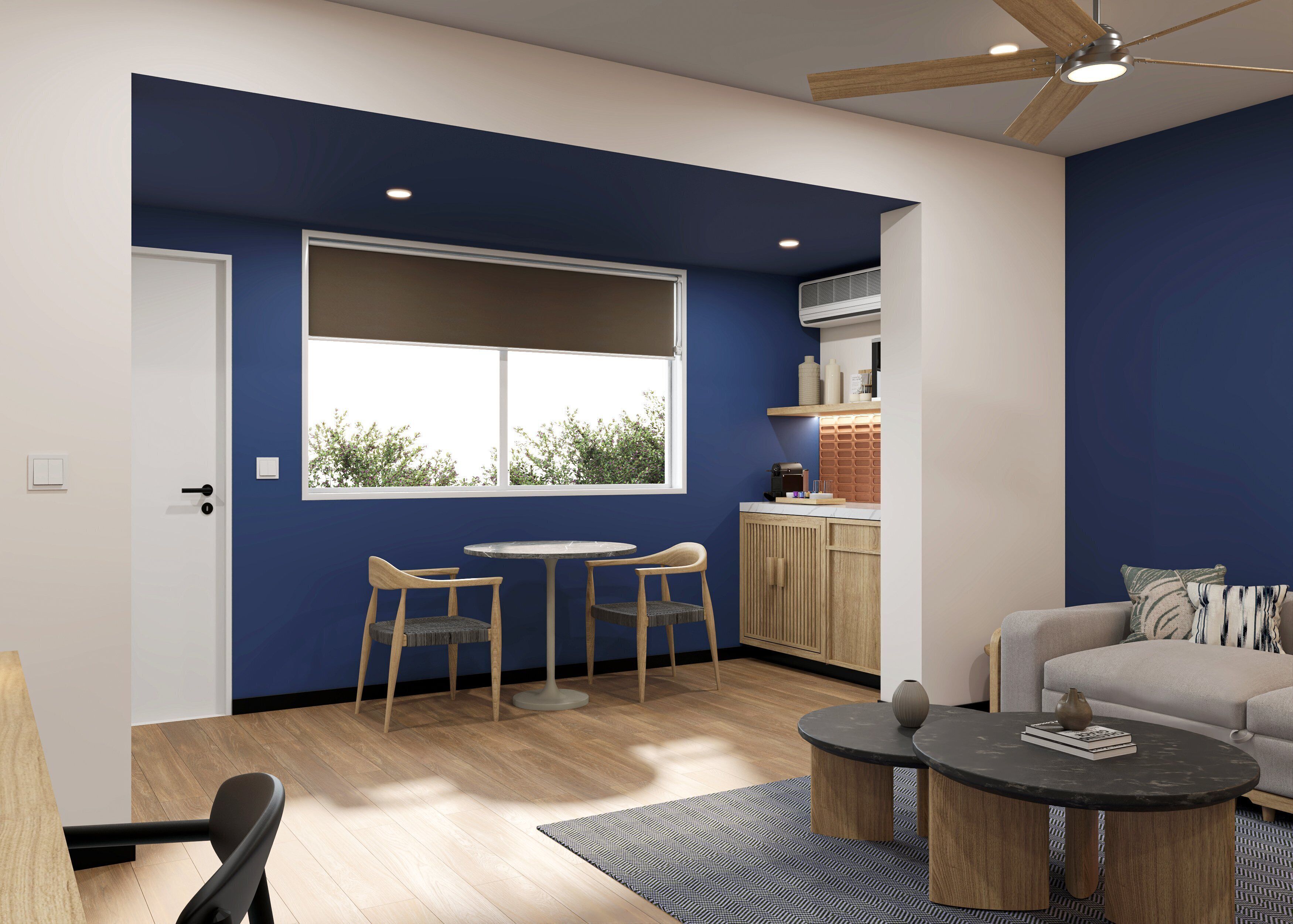 A modern living room with a dining area, a kitchen, and a large window.