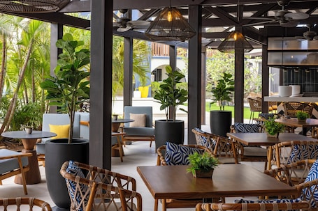 Breakfast, lunch and dinner served. voco Surfside Aruba by IHG